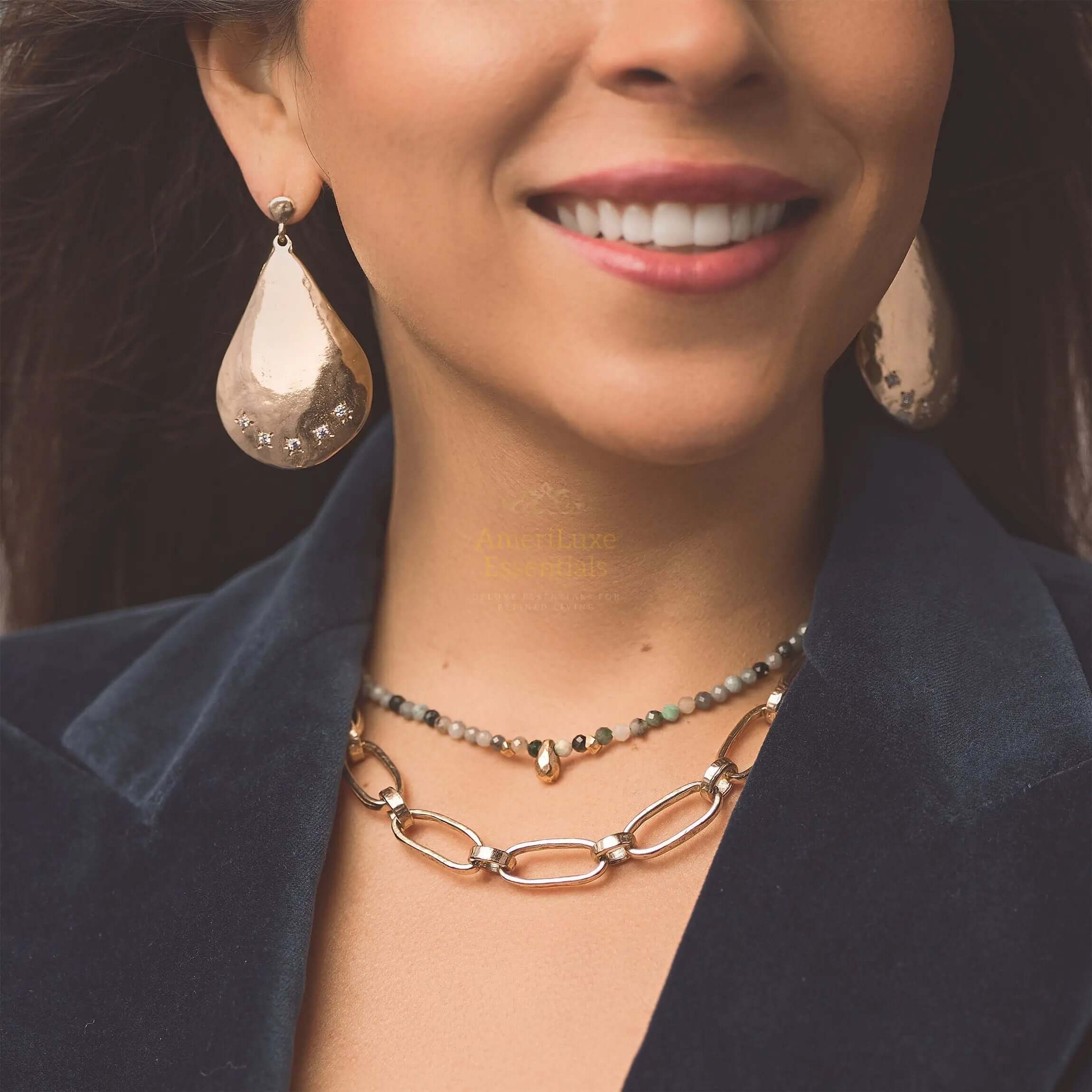 Close-up of a model wearing Parisian designer earrings, showcasing their elegance and polished design.