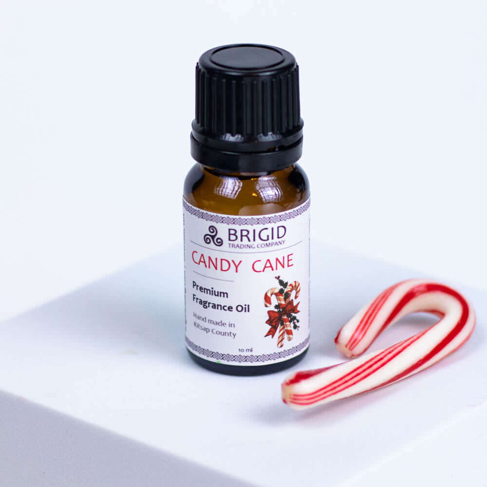 Diffuser Oil Blends - Essential and Premium Fragrance Blends: Candy Cane Premium Fragrance Oil with candy cane decoration.