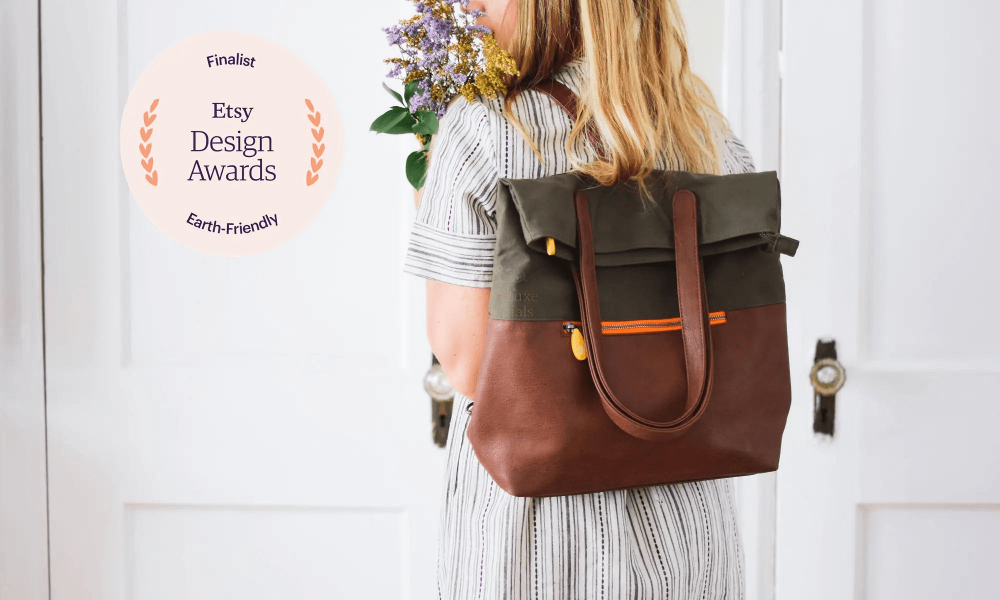 Person wearing the Greenpoint Convertible Backpack Purse, a finalist in Etsy Design Awards, showcasing its versatile design.