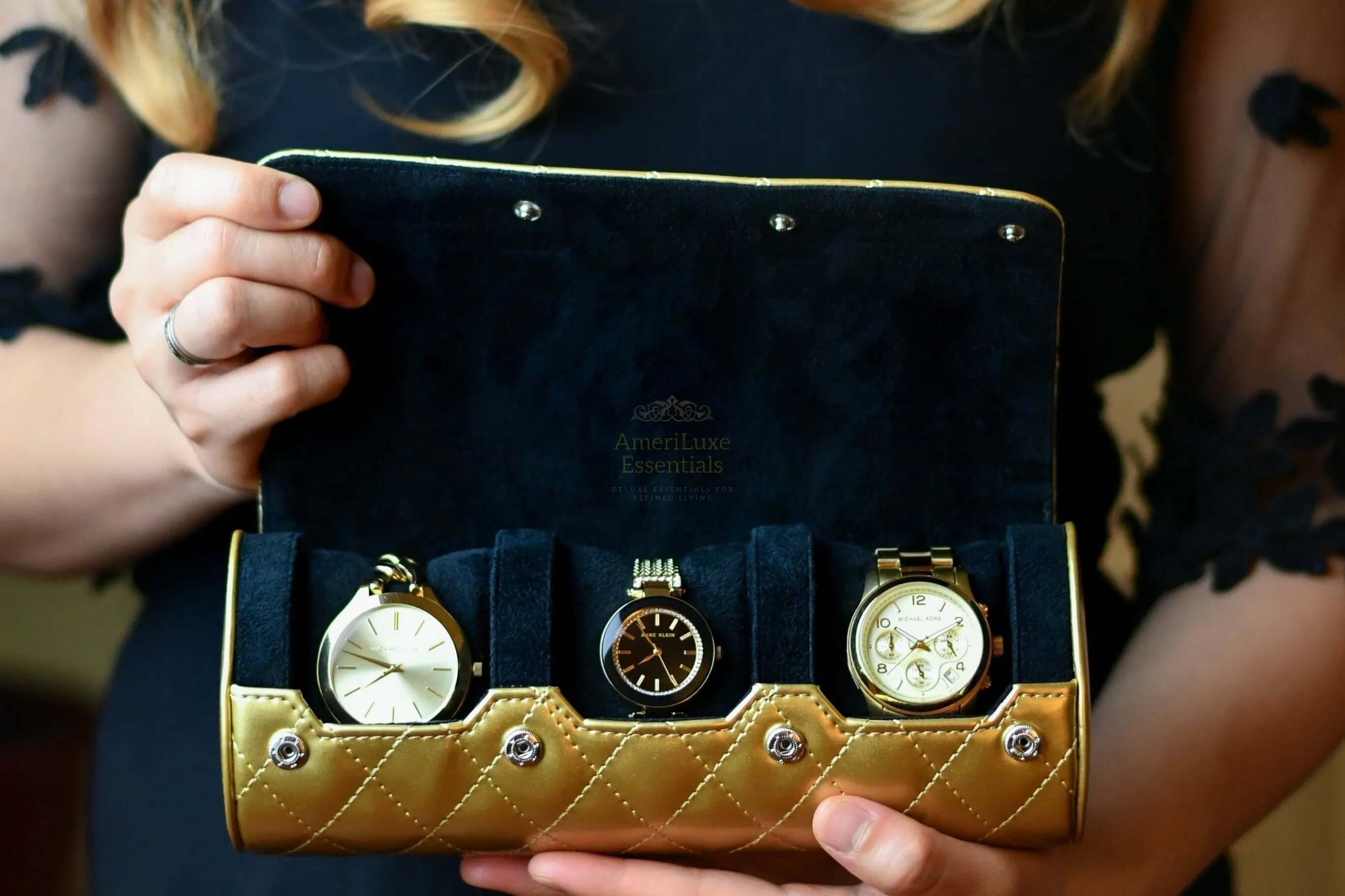 Limited edition women's watch case showcasing three elegant watches in glossy royal gold design.