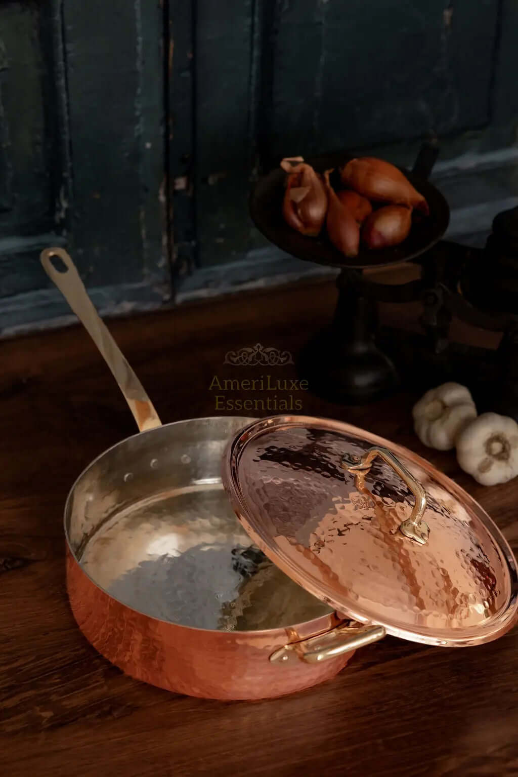 CMK Farmhouse Kitchen Copper Large Saute Pan on a wooden table with rustic background.
