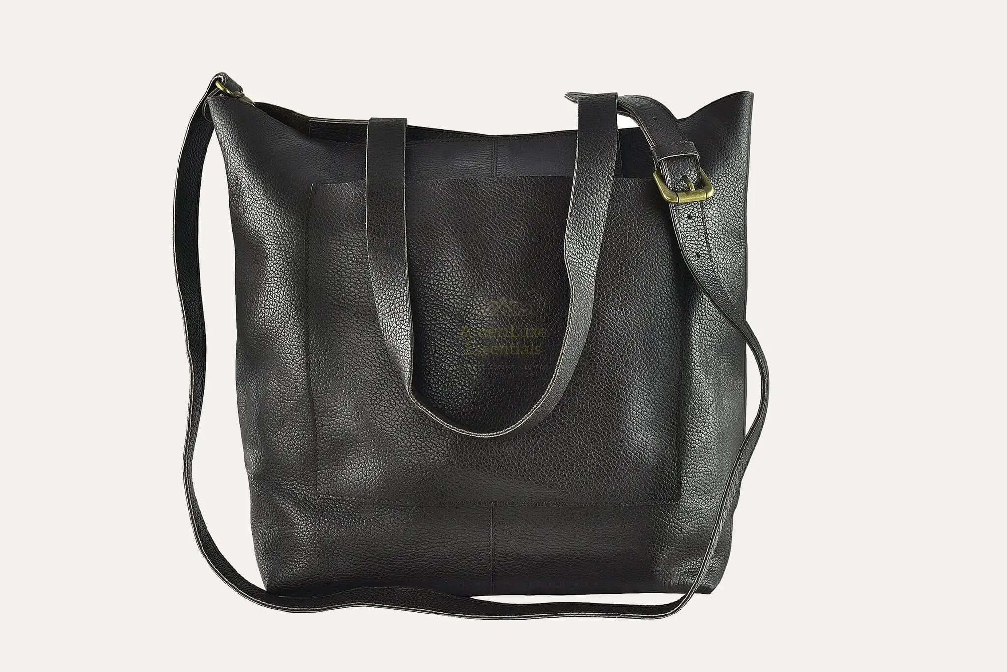 Professional journalist tote bag made of top grain cowhide pebble leather, featuring an unlined interior and removable strap.