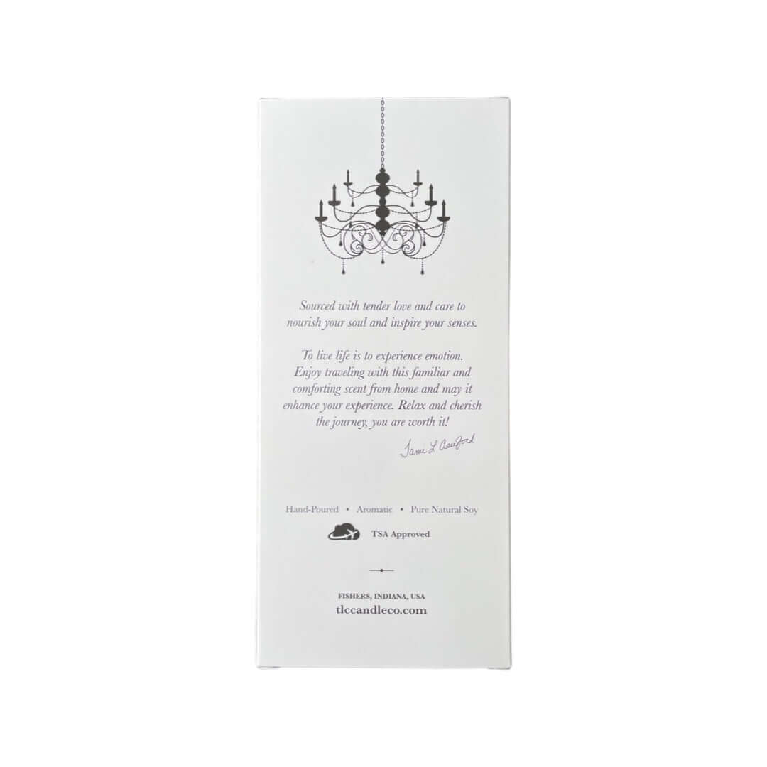 Travel Candle with Matches - Pomme Cider packaging featuring a chandelier and fragrance notes.