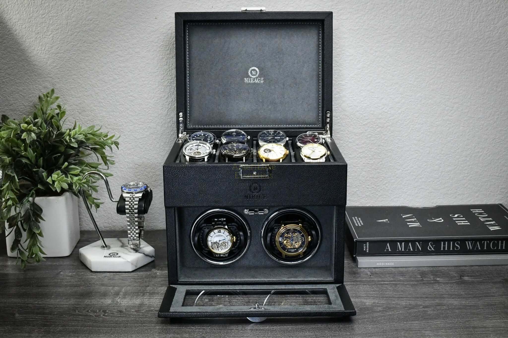 Luxury Watch Winder Box - Ebony Black displaying automatic watches and elegant design on a stylish wooden surface.