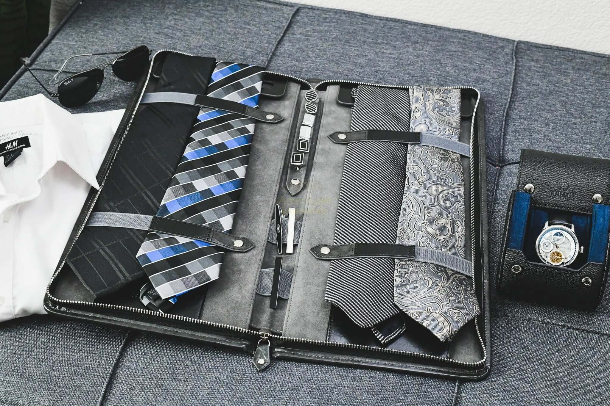 Travel tie case open with stylish ties organized, perfect for keeping accessories wrinkle-free and elegant.