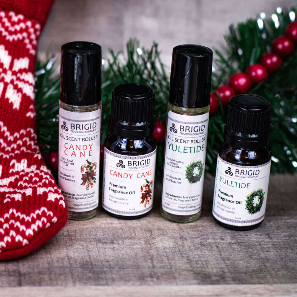 Diffuser Oil Blends - Essential and Premium Fragrance Blends, featuring Candy Cane and Yuletide scent rollers in festive setting.